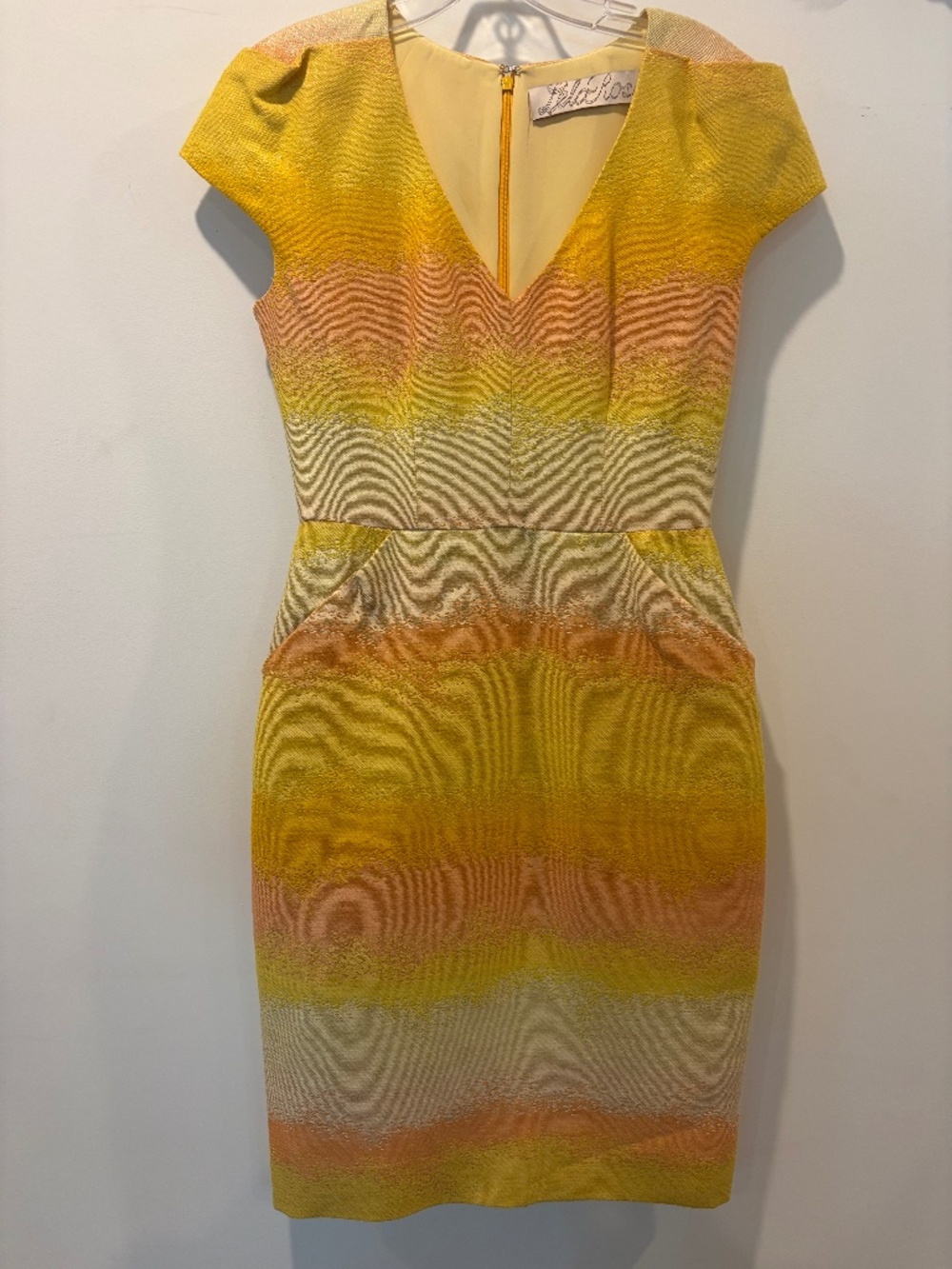 Jimmy Chu clutch & Lela Rose dress